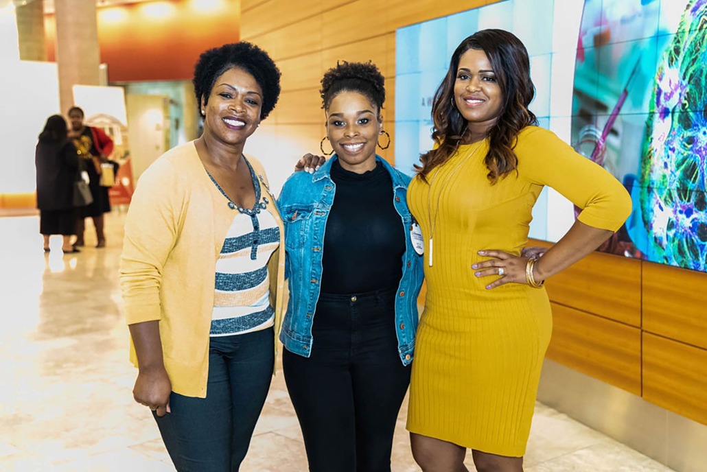 three women looking at camera