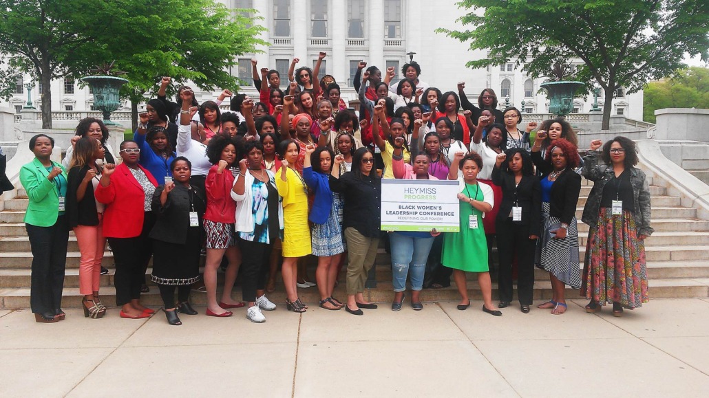 Group of women at the Hey Miss Black Women's Leadership Conference on steps in front of Madison Capitol building